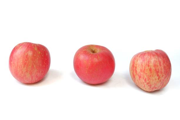 istock fresh fuji apple isolated on white background 1403989302
