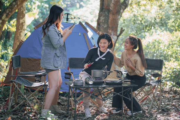 istock three bestie go camping in the forest 1403989597