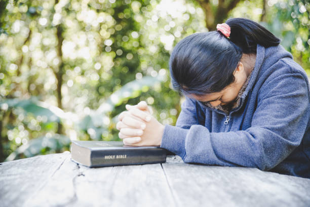 istock Prayer woman hand 1403990781