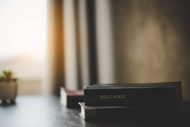 istock The bible is placed on the table 1403991119