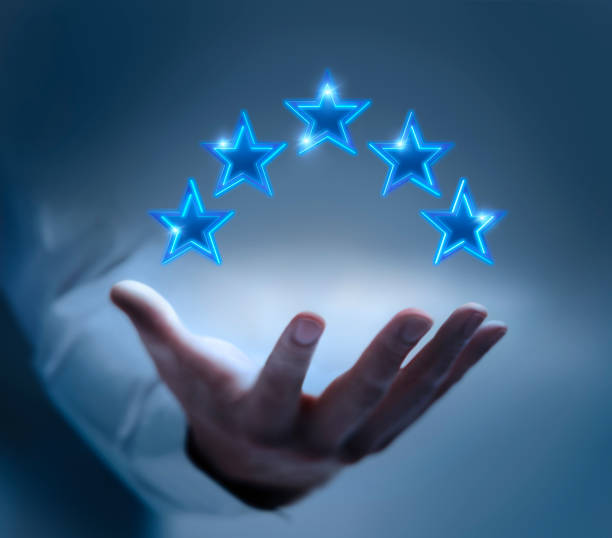 istock Hand with blue glowing stars 1403991257