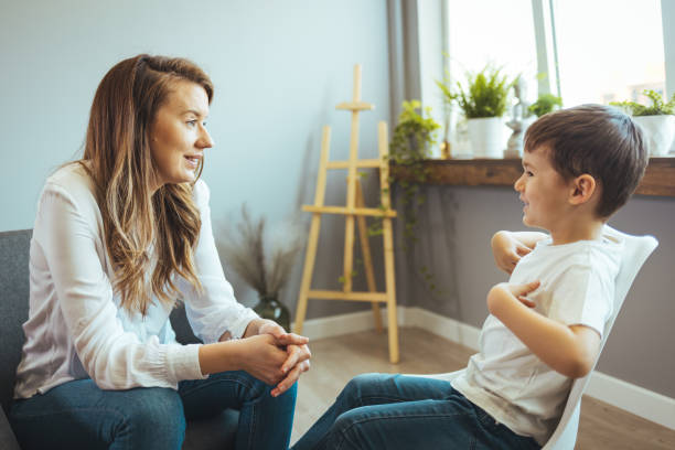 istock Young boy having therapy with a child psychologist 1403991571