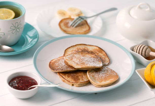 istock Pancaked powdered with sugar, jam and honey 1403993480