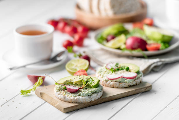 istock Flatbread with avocado and raddish, cup of tea 1403993507