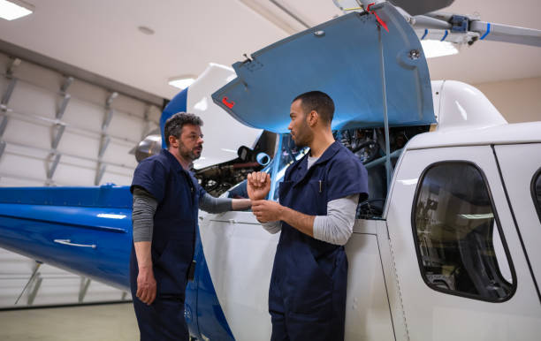 istock Two Aircraft Mechanics In The Hangar 1403994288