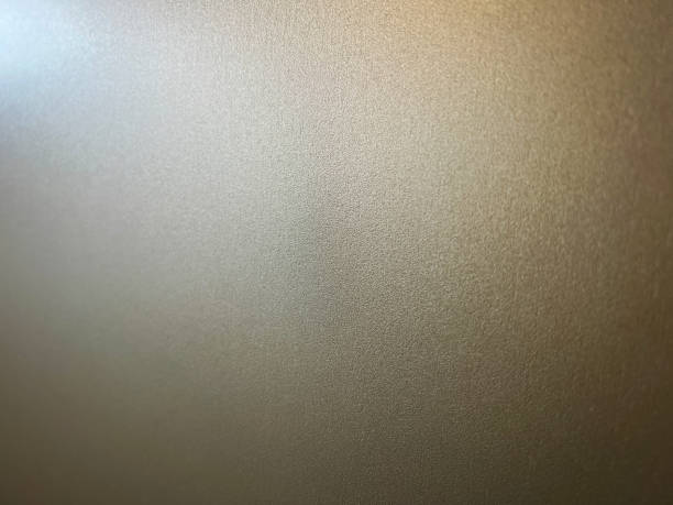 istock A macro image of a white wallpaper in the dark as a texture or background. 1403994632