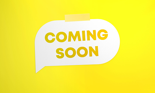 Coming Soon Written White Speech Bubble On Yellow Background. Communication Concept.