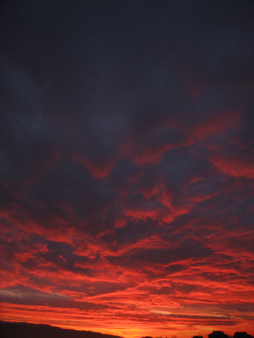 Cloudscape during sunset, with extreme red colors