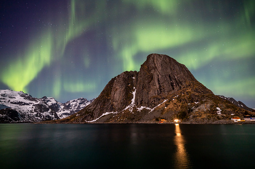 Beautiful aurora Northern lights over Hamnoy, in the Lofoten islands, Norway