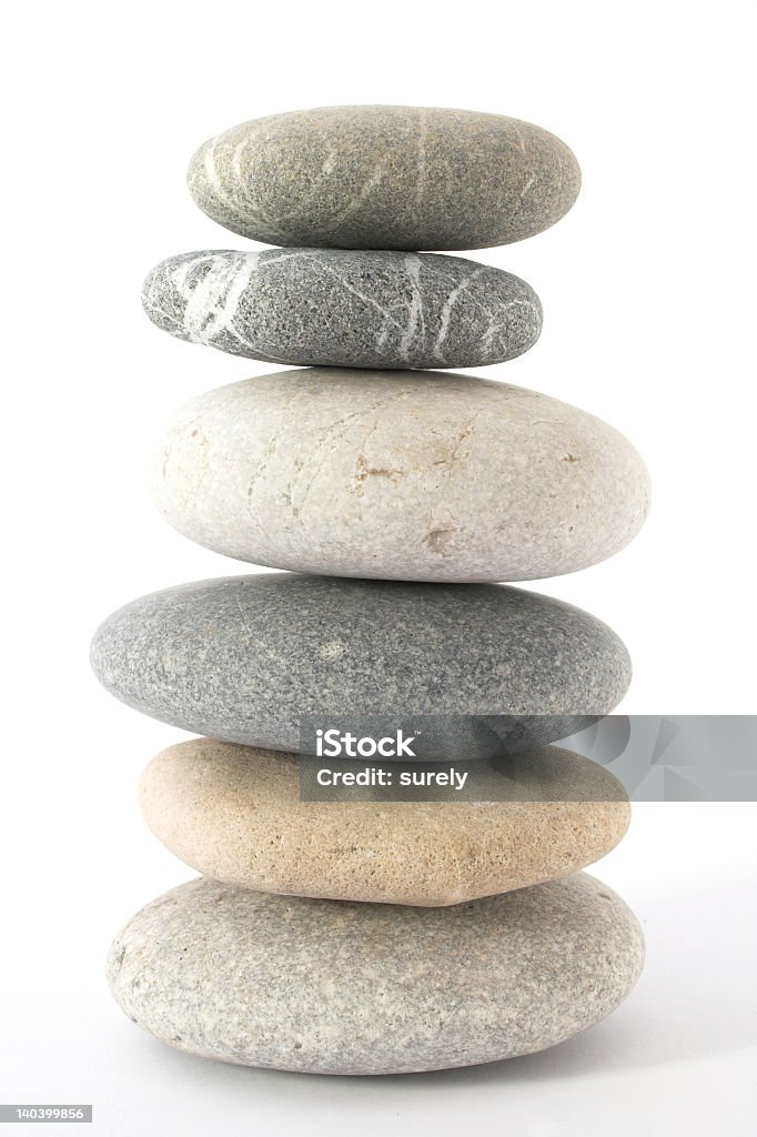 A balancing stack of pebbles on top of each other image of  balancing pebbles Architecture Stock Photo