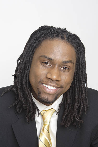istock Happy Black Man Suit Dreadlocks Genuine Smile 140399941
