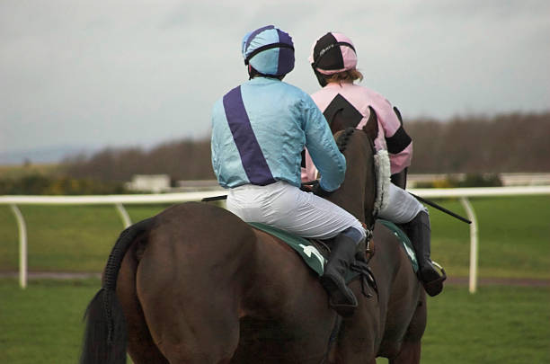 istock Horse racing two mounted jockeys 140399958