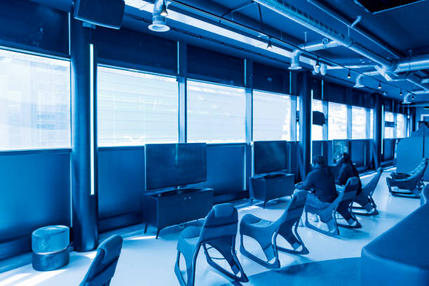 blurred image of graduate student playing jazz music at University or high school when Audiences standing for view. learner are show music performance concept