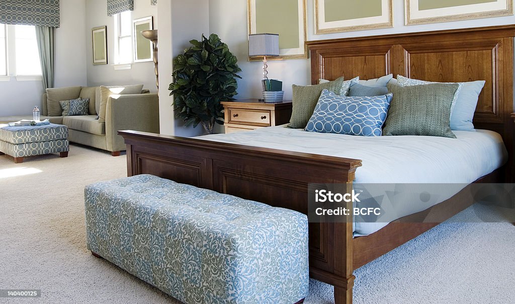 Moderna camera da letto - Foto stock royalty-free di Accogliente