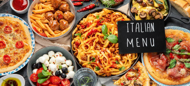 istock Italian food assortment on dark background. 1404001891