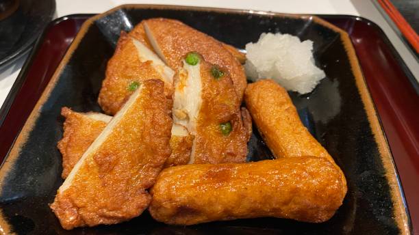 satsumaage in Japan Satsumaage which is deep‐fried minced fish and vegetables. chikuwa stock pictures, royalty-free photos & images