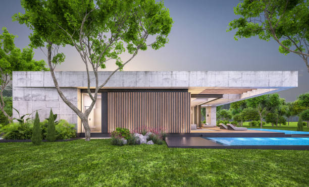 istock 3d rendering of new concrete house in modern style in evening 1404004206