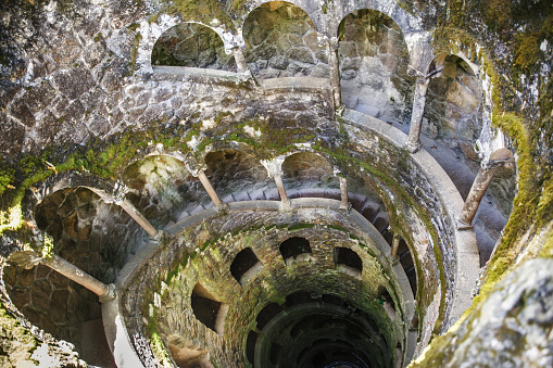 The Initiation well of Quinta da Regaleira in Sintra. It connects with other tunnels through underground passages. Sintra. Portugal.