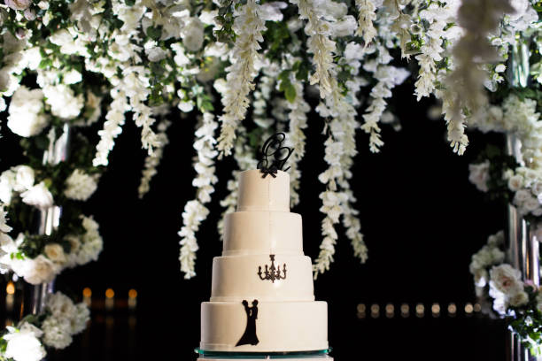 istock Multilevel wedding cake decorated with colorful flower 1404004546