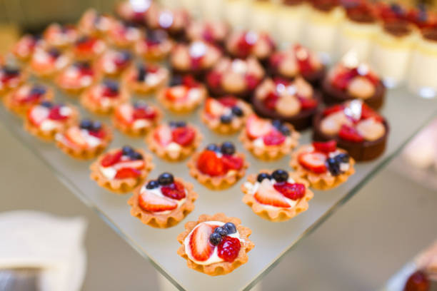 Rows of desserts on the wedding table.