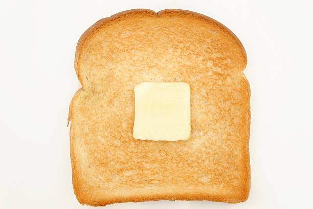 istock single piece of toast with butter 140400469