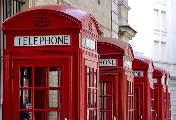 istock Red telephone booths in London 140400539