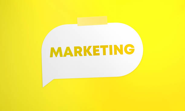istock Marketing Written White Speech Bubble On Yellow Background 1404005599