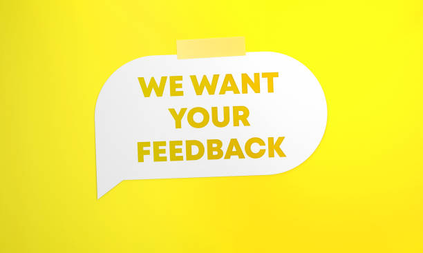istock We Want Your Feedback Written White Speech Bubble On Yellow Background 1404006052
