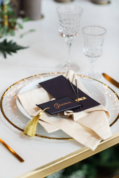 istock Cards with inscriptions on a plate on a wedding table 1404007340