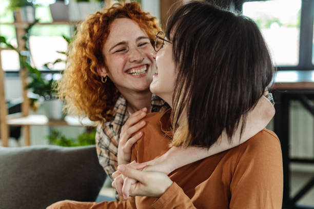 istock LGBT Lesbian couple at home 1404008099