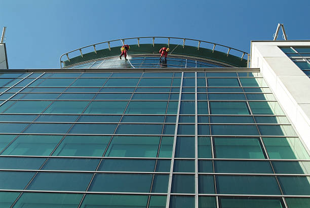 istock Men climb a palace made of glass 140400821
