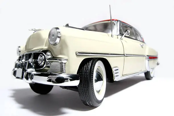 Picture of a 1953 Bel Air. Taken with a fisheye lens as a picture. Very hard to flash as the frontlens is only 3 cm away from the object.(a lot of reflectors were placed at the sides and round the lens) Detailed scale model from my brothers toy collection.