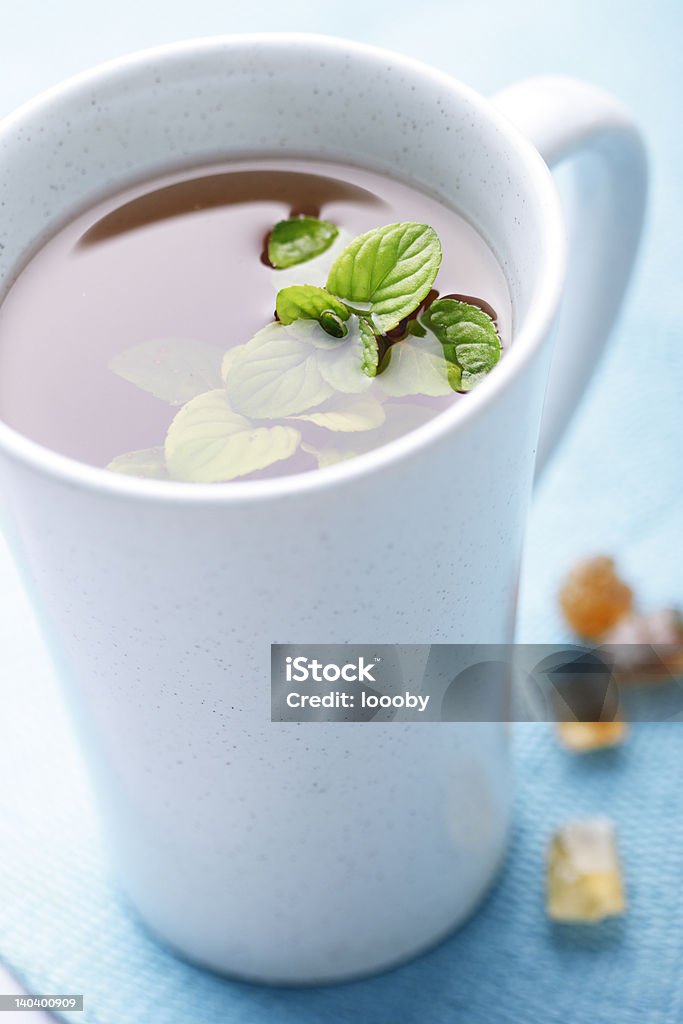 like tea closeup of herbal tea with fresh leafs and candis rocks Healthcare And Medicine Stock Photo