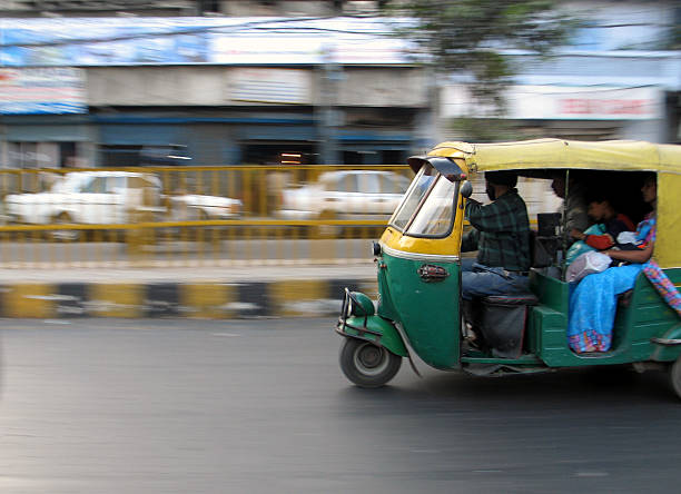 Car on the move down the street stock photo