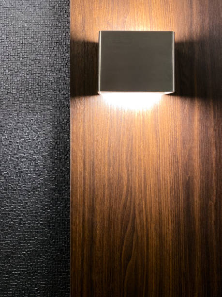 Modern Light fixture on wooden wall