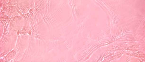 istock banner background transparent pink clear water wave surface texture 1404010975