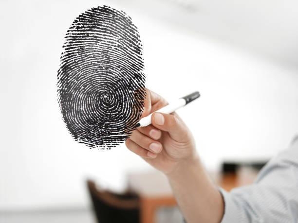istock Businessman drawing a fingerprint 1404011569