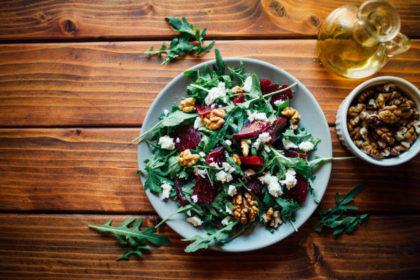 istock Arugula and beetroot salad with walnuts and feta cheese 1404012296