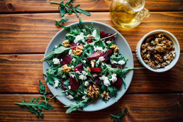 istock Arugula and beetroot salad with walnuts and feta cheese 1404012316