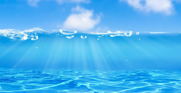 istock beautiful blue underwater wave with sun reflections on the floor, empty water background concept for sports, recreation, beach vacation, water resources 1404012754