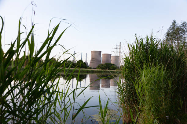 istock Nature reserve and power plant close together 1404013611