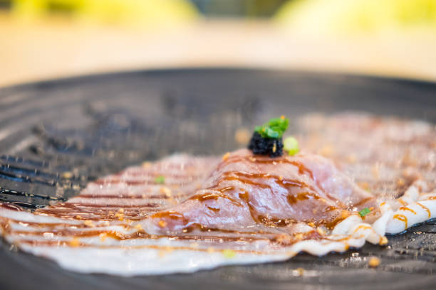 istock Medium rare sliced authentic A5 grade Japanese wagyu beef sushi. 1404014077