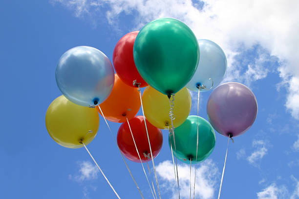 istock Coloured balloons against sky 140401598