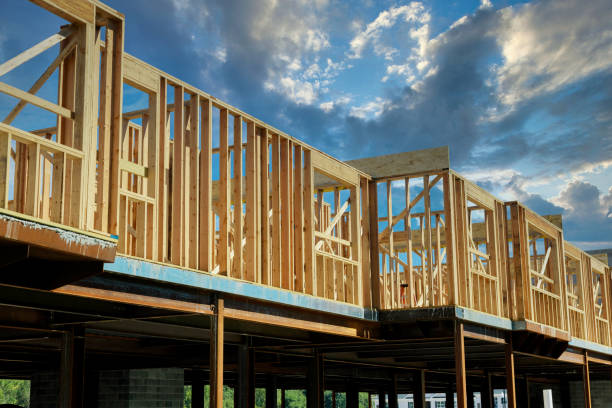 istock Construction wood framing beams of a new house under construction 1404017483
