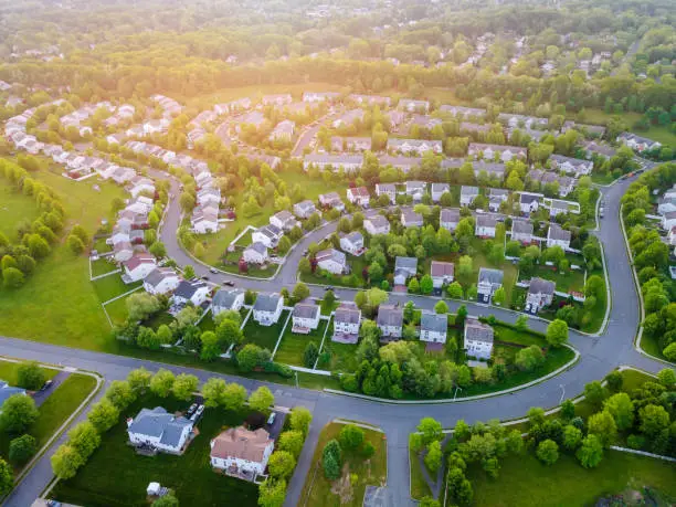 Photo of Aerial panorama view of a small town city home roofs at suburban residential quarters an New Jersey US