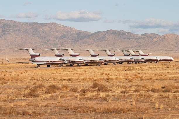 istock Abandoned airplanes in an aircraft graveyard 140401784