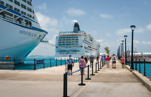 Royal Naval Dockyard, Bermuda- May 24, 2022-  Passengers of all ages disembark from the luxury cruise ship  \
