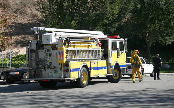 istock Firefighter walking by a fire truck 140402104