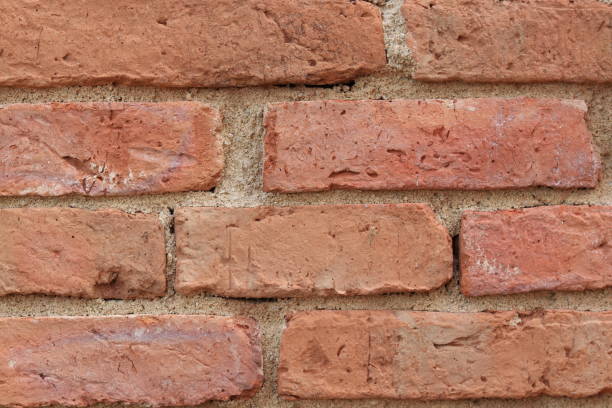 istock Background texture of laterite stone wall. 1404021323