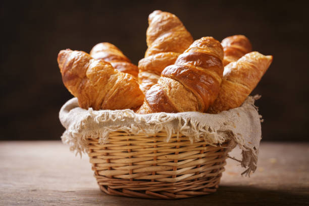 istock Basket of fresh croissants 1404021478